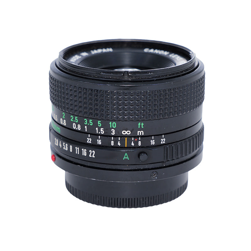 Brugt Canon New FD 28mm f/2.8 set fra siden med afstandsskala