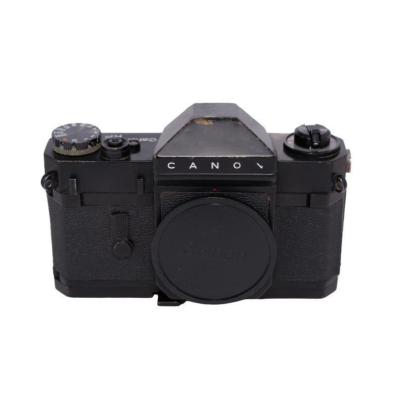Canonflex RP sort set ovenfra bagfra med messing synligt i ridserne og serienummer 101278